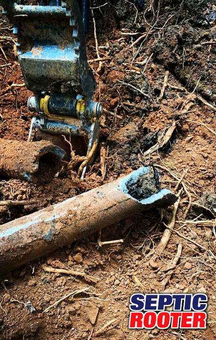 Failed corroded septic pipe repaired by SepticRooter™ in Chamblee, GA — licensed septic contractor